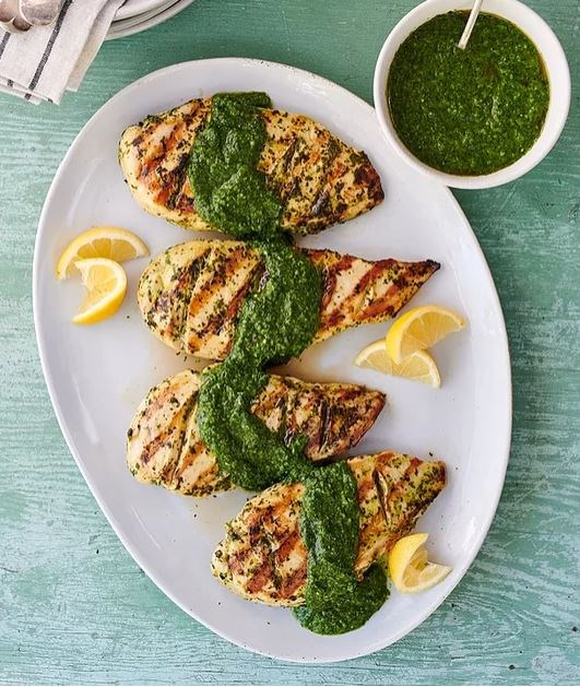 Chicken breasts with green herb salsa