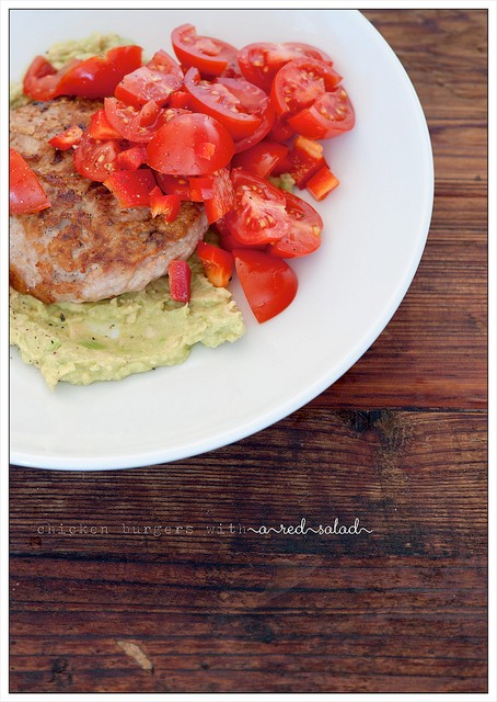Chicken burgers with avocado & red salad
