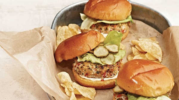 Chicken burgers with lime, pepper, and pickle