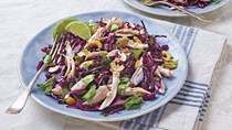 Chicken cabbage salad with basil, cilantro, and cashews