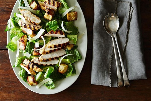 Chicken Caesar salad with anchovy-Caesar vinaigrette and garlic-Parmesan croutons