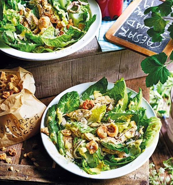 Chicken Caesar salad with pork scratching 'croutons'