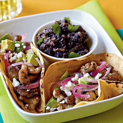 Chicken carne asada tacos with pickled onions