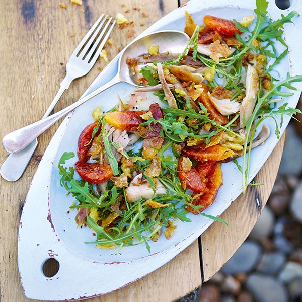Chicken confit and rocket salad with blood oranges