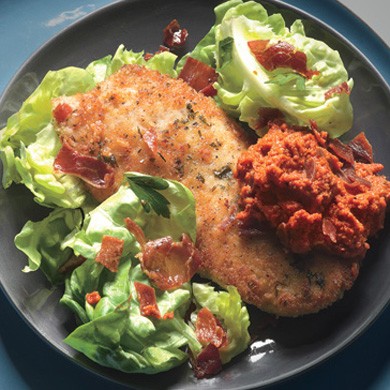 Chicken cutlets with romesco and serrano cracklin's