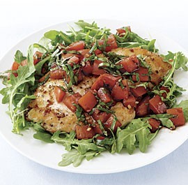 Chicken cutlets with tomatoes and basil