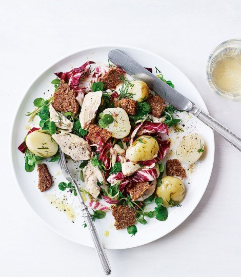 Chicken, dill and potato salad with anchovy dressing and rye bread croutons