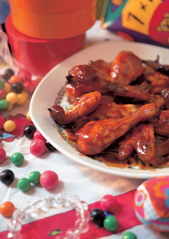 Chicken drumsticks and wings with orange-tomato sauce
