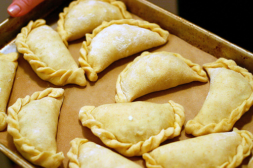 Chicken empanada with chorizo and olives
