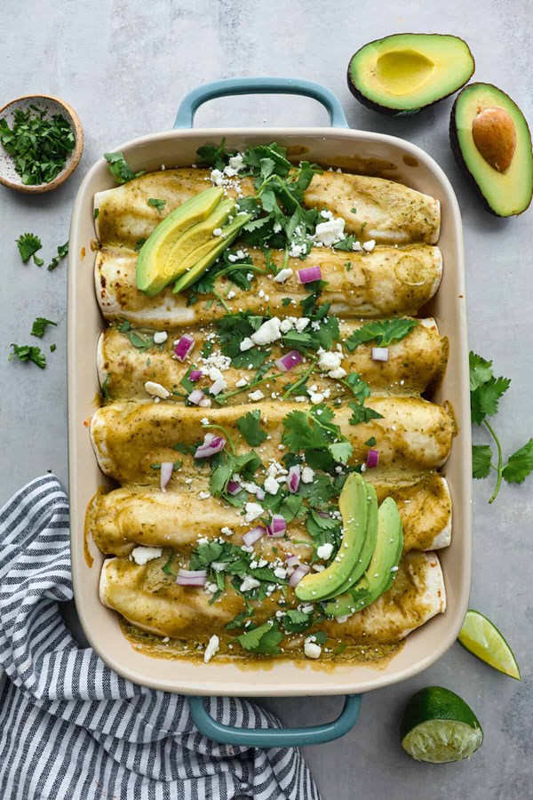 Chicken enchiladas with avocado cream sauce