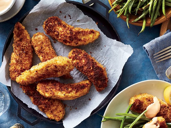 Chicken fingers and green beans with tahini sauce