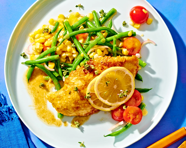 Chicken Francese with corn & green bean salad