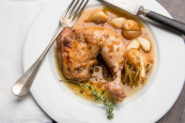 Chicken fricassee with new garlic