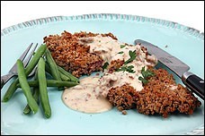 Chicken-fried steak with sausage gravy