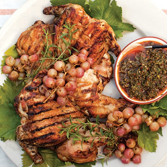 Chicken grilled under a brick