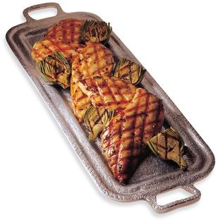 Chicken grilled under bricks