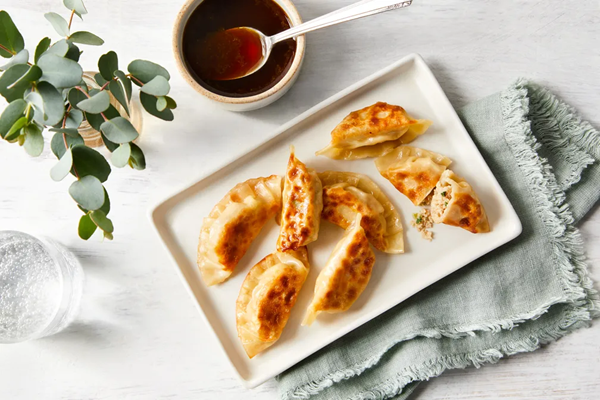 Chicken gyoza with yuzu dipping sauce