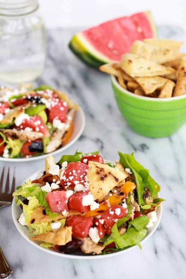 Chicken gyro salad with homemade pita chips, watermelon and feta