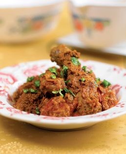 Chicken in spicy coconut gravy (Ayam rendang)