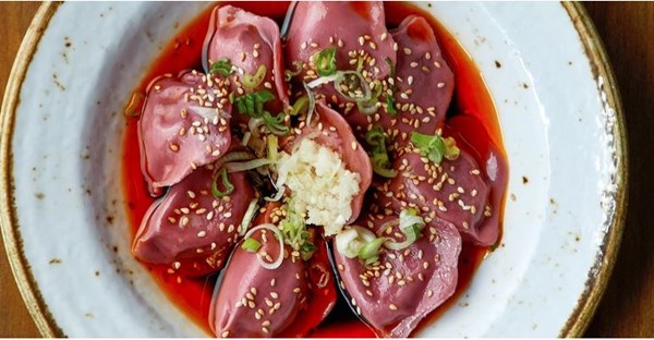 Chicken jiaozi with chilli oil