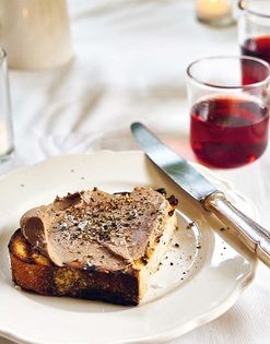 Chicken liver pâté on crostini with a glass of Chianti