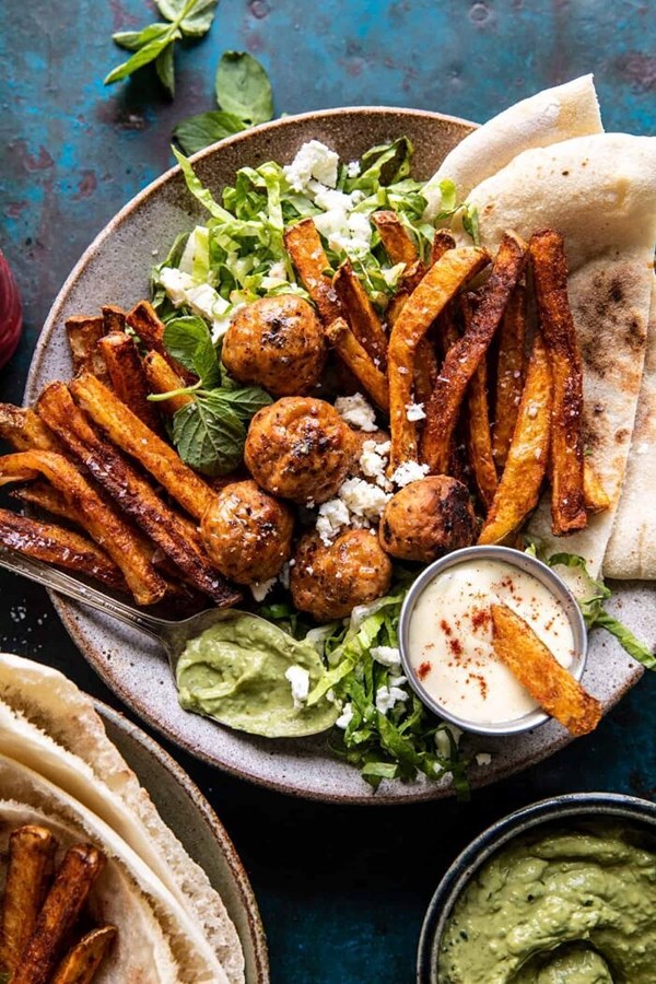 Chicken meatball pita bowls with seasoned fries and feta (+ fry sauce)
