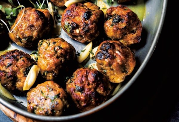 Chicken meatballs sautéed with garlic and herbs