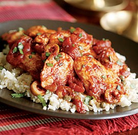 Chicken medallions with spiced tomatoes, caper & olive sauce