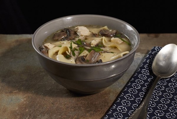 Chicken noodle soup with sautéed mushrooms & Parmigiano