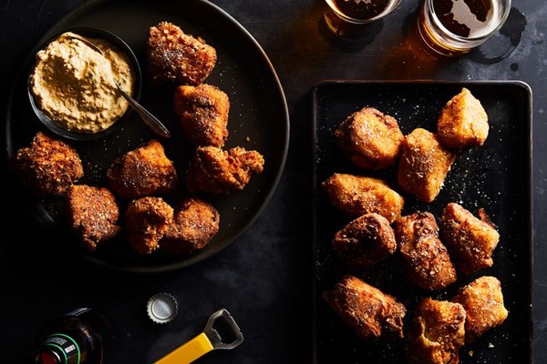 Chicken nuggets with warm kimchi-bacon ranch dip
