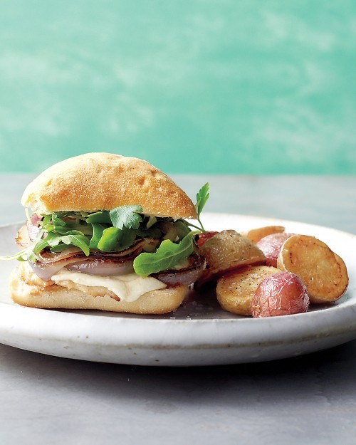 Chicken, onion, and mozzarella sandwiches with roasted potatoes