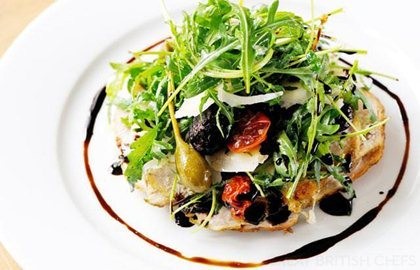 Chicken paillard with caper berries and roasted plum tomatoes