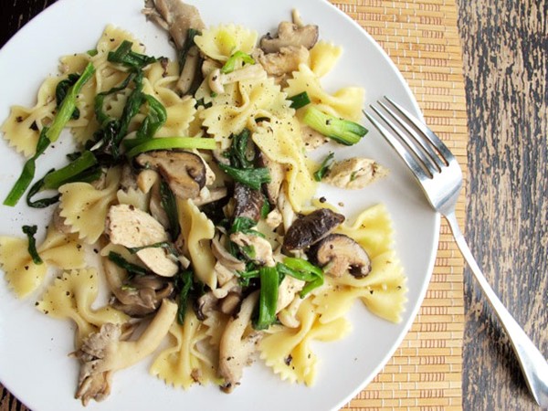 Chicken pasta with mixed mushrooms and green onions