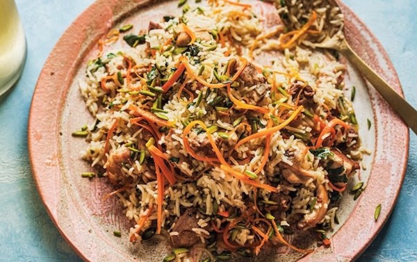 Chicken pilaf with cardamom, carrot and orange