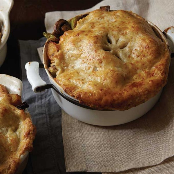 Chicken pot pies with fall vegetables and golden cheddar crusts recipe
