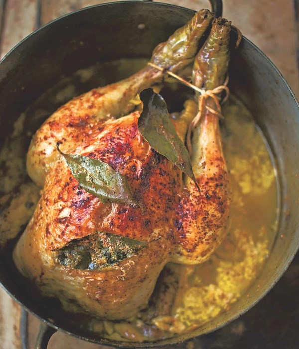 Chicken pot-roasted in milk, bay and nutmeg