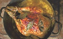 Chicken pot-roasted in milk, bay and nutmeg
