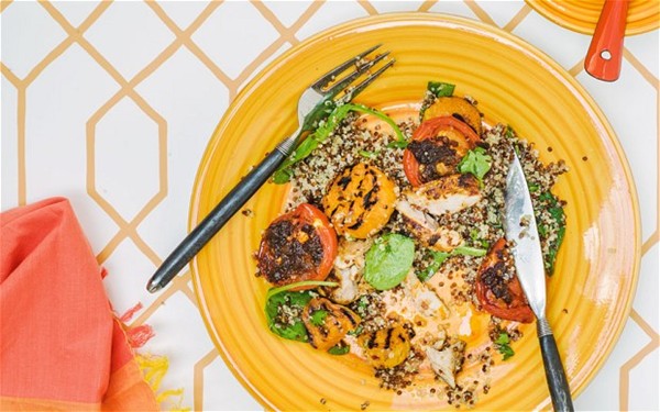 Chicken salad with sweet potato, tomatoes and quinoa