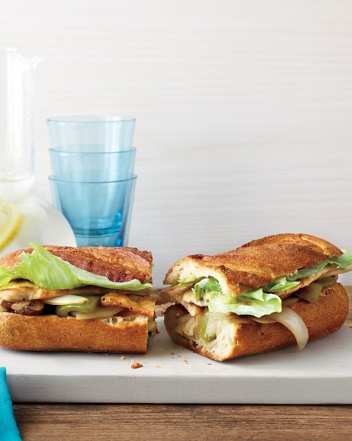 Chicken sandwiches with white onions and peppers