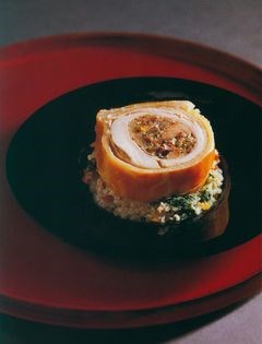 Chicken sausage roll with cauliflower and pistachio