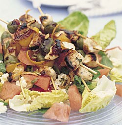 Chicken skewers on watermelon and feta salad