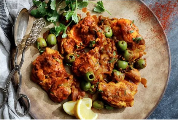 Chicken smothered with olives