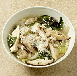 Chicken soup with barley, mushrooms, and greens