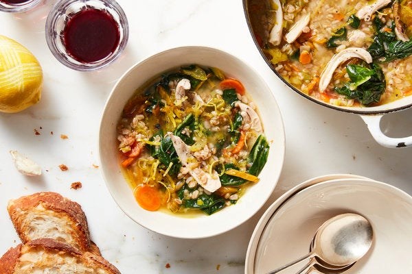 Chicken soup with toasted farro and greens