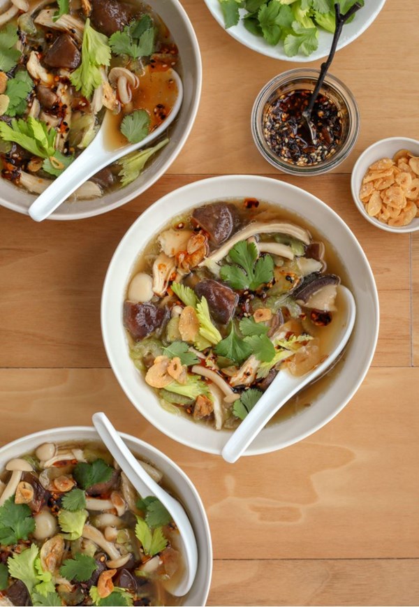Chicken soup with toasted garlic, mushrooms, and celery