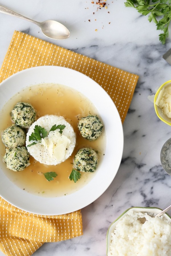 Chicken spinach meatball soup with broth and rice