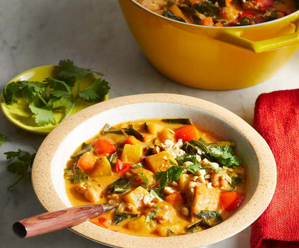Chicken stew with collard greens and peanuts