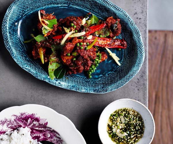 Chicken stir-fried with red curry, green peppercorns and holy basil