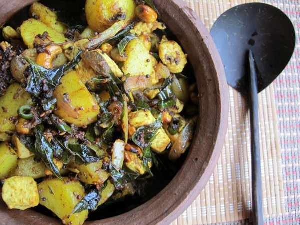 Chicken stir fry with potato, cashews, and curry leaves
