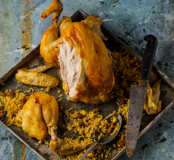 Chicken stuffed with rice, almonds and raisins